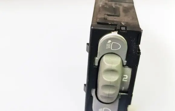 Headlight level height control switch