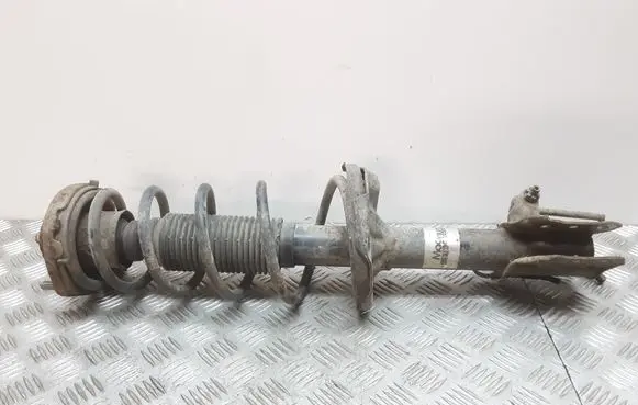 Mazda 323 Front shock absorber with coil spring