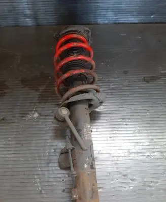 Volkswagen Scirocco Front shock absorber with coil spring