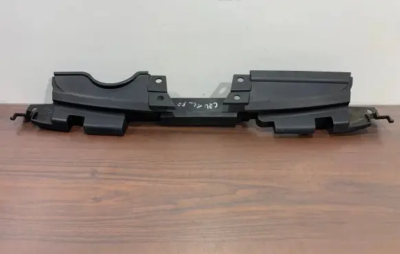 Engine bonnet/hood lock trim molding