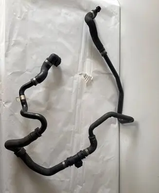 Mercedes-Benz E C207 W207 Engine coolant pipe/hose A2125010024