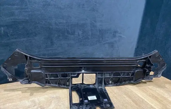Radiator support slam panel