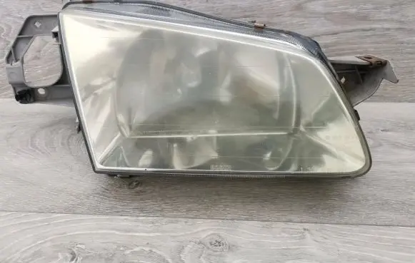 Mazda 323 Headlight/headlamp 1305235393