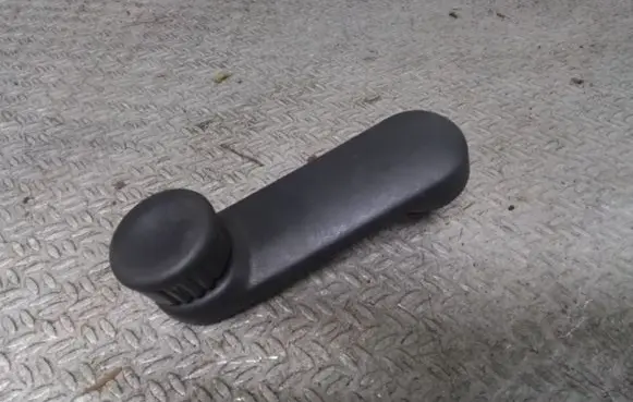Renault Thalia II Front door window winding handle 7700811387