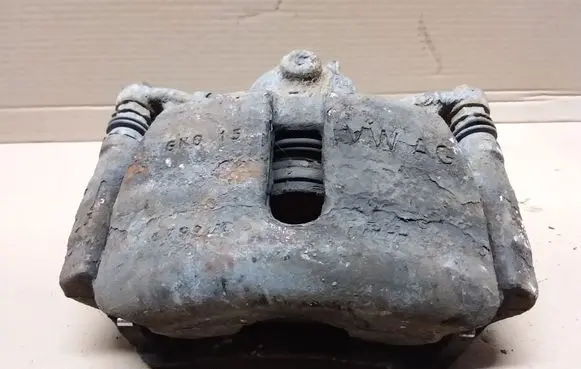 Volkswagen Golf VII Front brake caliper