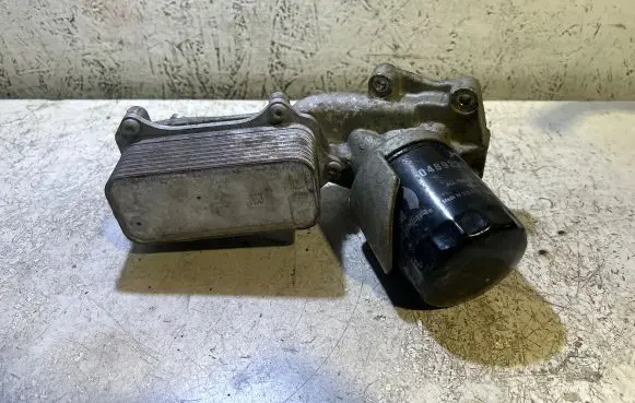 Jeep Grand Wagoneer Oil filter mounting bracket 68480745AE