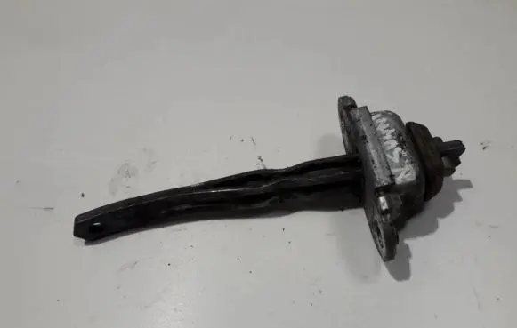 Front door check strap stopper
