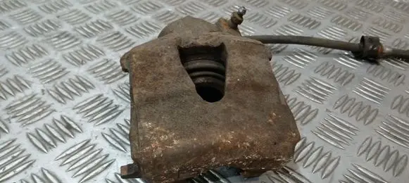 Volkswagen Golf VI Front brake caliper 