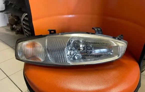 Mitsubishi Colt Headlight/headlamp 10087279