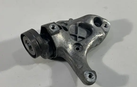 Volkswagen Golf Plus A/C compressor mount bracket 1K0260885B 03C145299L