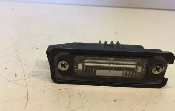 Volkswagen Golf V Number plate light 1J6943021B