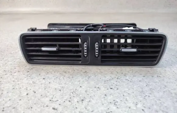 Dash center air vent grill