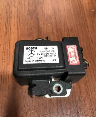 Mercedes-Benz E W210 ESP acceleration yaw rate sensor LU0015404517 0265005230 Q04