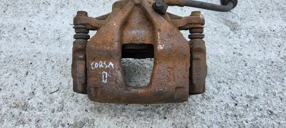 Opel Corsa D Front brake caliper 