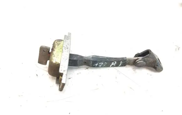 Front door check strap stopper