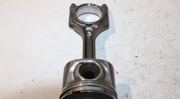 Piston with connecting rod
