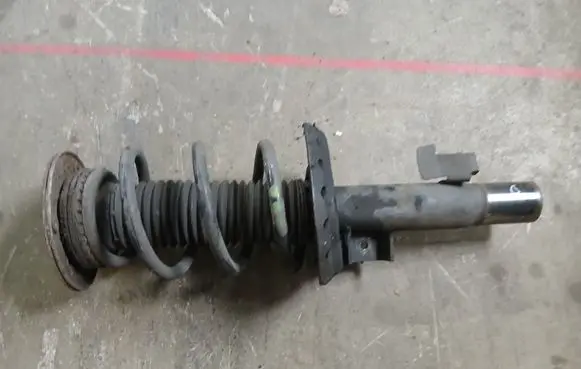Volvo V60 Front shock absorber with coil spring 31360102