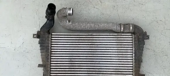 Opel Zafira B Intercooler radiator 13171435