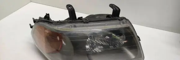Mitsubishi Pajero Sport I Headlight/headlamp 10087415