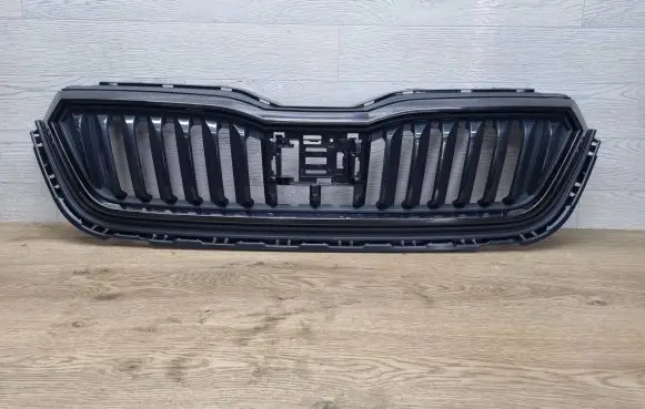 Skoda Scala Front bumper upper radiator grill 657853653