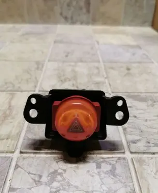 Nissan Almera Tino Hazard light switch 06016