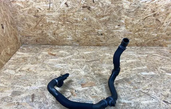 Volkswagen Golf VII Engine coolant pipe/hose 5Q0121049CM