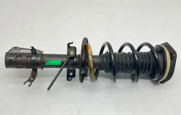 Renault Kangoo II Front shock absorber with coil spring