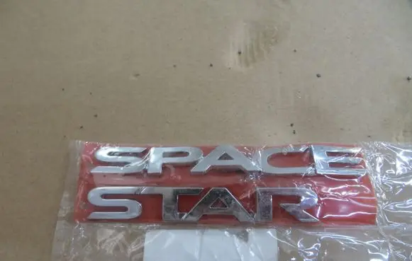 Mitsubishi Space Star Manufacturer badge logo/emblem 7415A523