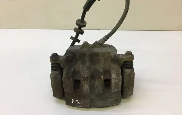 Jeep Cherokee Front brake caliper OEM