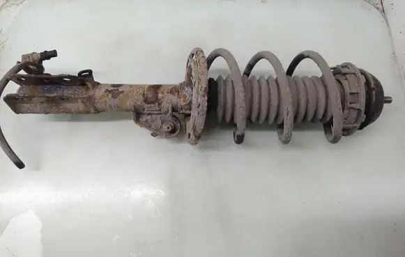 Honda Jazz Front shock absorber with coil spring 