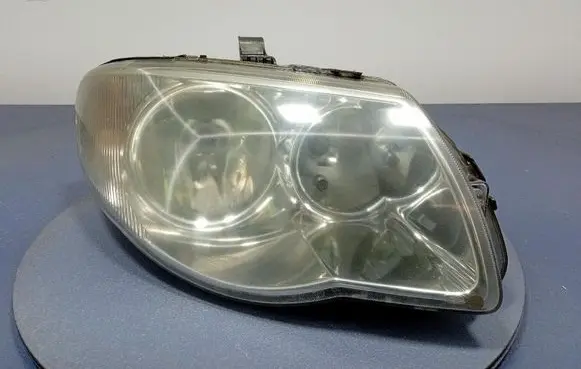 Chrysler Grand Voyager V Headlight/headlamp 04857831AC