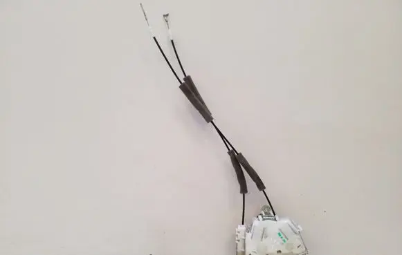Honda FR-V Front door lock OEM
