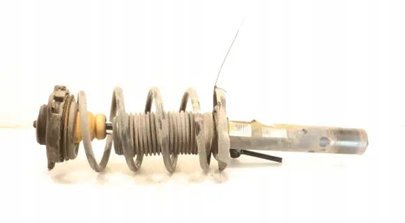 Volkswagen Golf VI Front shock absorber with coil spring