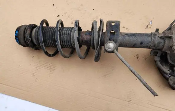 Front shock absorber with coil spring