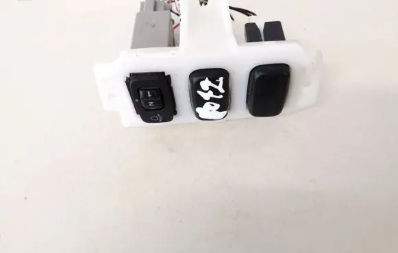 Mitsubishi Lancer X Headlight level height control switch