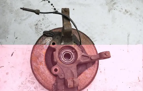 Front wheel hub spindle knuckle