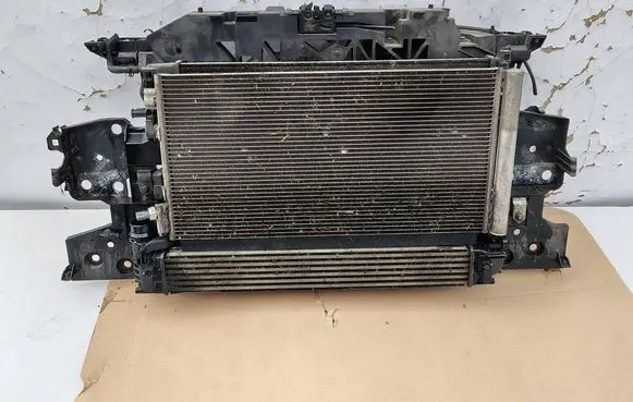 Radiator support slam panel