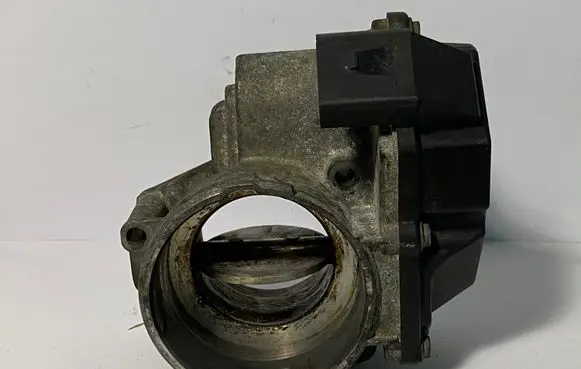 Volkswagen Touran I Throttle valve 03G128063G A2C53249824