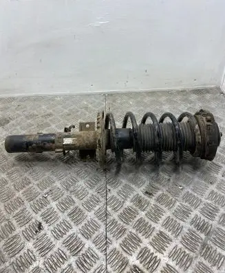 Volkswagen Polo Front shock absorber with coil spring 5Q0413031