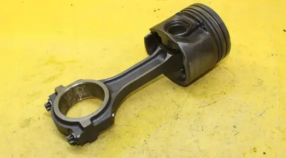 Piston with connecting rod
