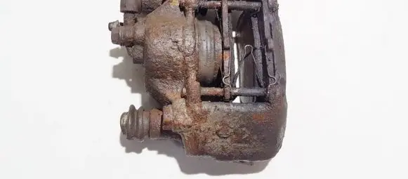 Mazda 323 F Front brake caliper
