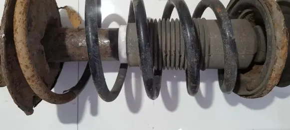Suzuki Swift I Front coil spring
