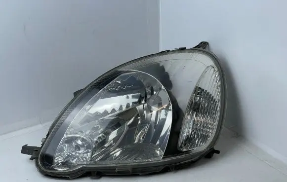 Toyota Yaris Headlight/headlamp 811500D081 89900176 052051