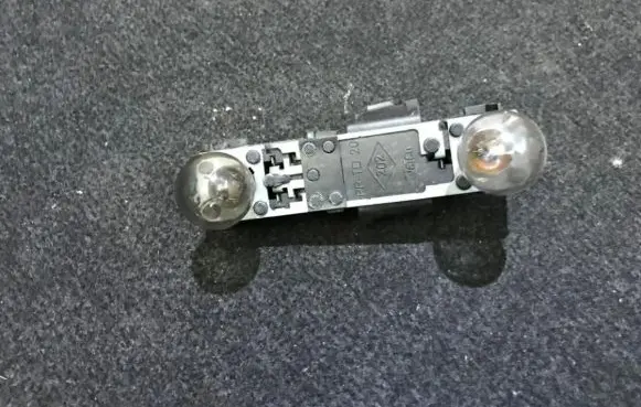 Renault Laguna I Tail light bulb cover holder