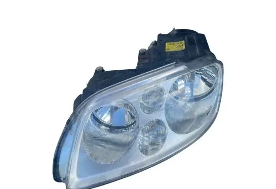 Volkswagen Touran I Headlight/headlamp 0301205201