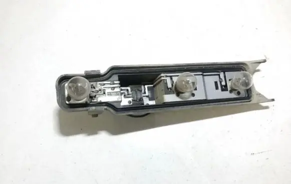 Ford Focus Tail light bulb cover holder xs64x13n004