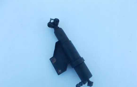 Headlight washer spray nozzle
