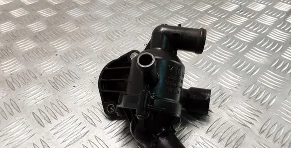 Thermostat/thermostat housing