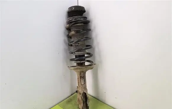 Volkswagen Caddy Front shock absorber with coil spring 6K0413031G