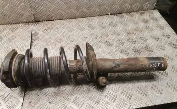 Volkswagen Golf VI Front shock absorber with coil spring